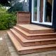 deck with wrap around stairway